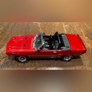 Ertl American Muscle 1969 Shelby
GT-500 Convertible die-cast model car.